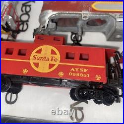Ho Scale santa fe locomotives and caboose with shells and parts