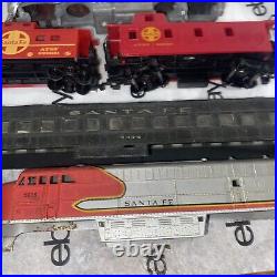 Ho Scale santa fe locomotives and caboose with shells and parts