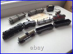 Marx O scale 2-4-2 locomotive # 999 and 6 cars, plus track & transformer