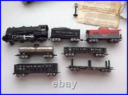 Marx O scale 2-4-2 locomotive # 999 and 6 cars, plus track & transformer